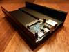 The Odroid HC2 as shipped, mounted in an open-faced aluminium enclosure